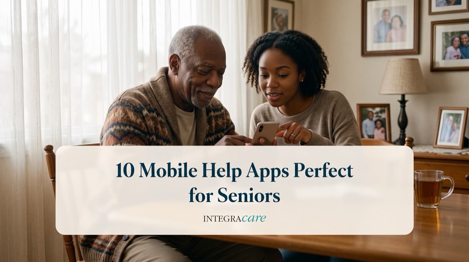 A younger woman helps an older man use a smartphone at his dining table under the title 10 Mobile Help Apps Perfect for Seniors