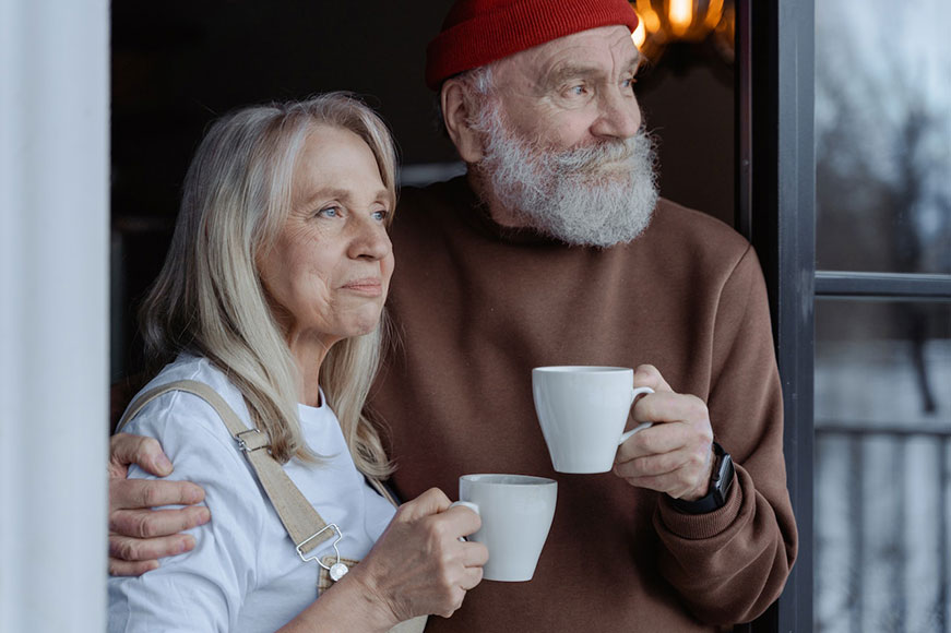 Picture of two seniors having coffee