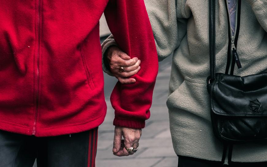 Person wearing red jacket