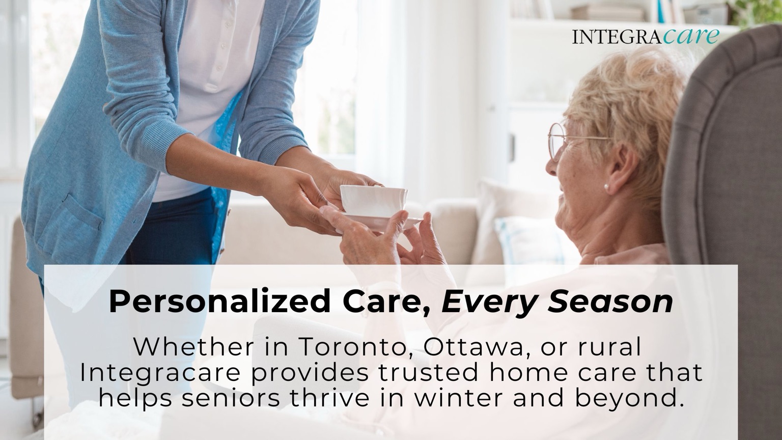 Caregiver handing a cup of tea to a smiling senior woman at home, symbolizing Integracare’s personalized senior home care in Toronto, Ottawa, and rural communities.