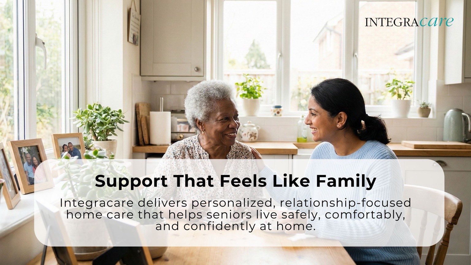 Caregiver assisting an older adult with an activity at a dining table in a bright home setting, reflecting companionship, daily support, and personalized senior home care.